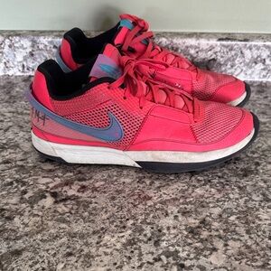 Nike Hot Pink basketball shoes with Blue Swoosh